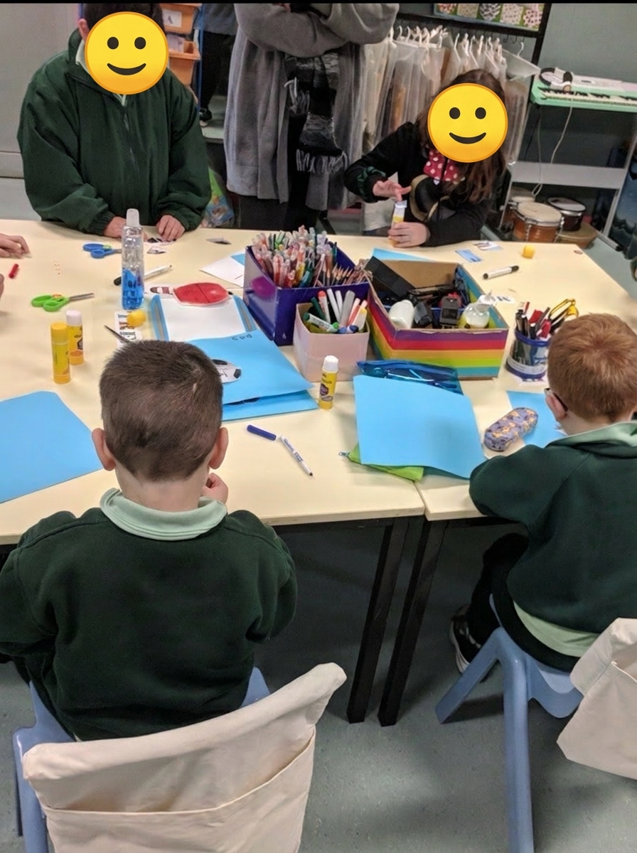 Children engaged in a classroom activity with Natalie